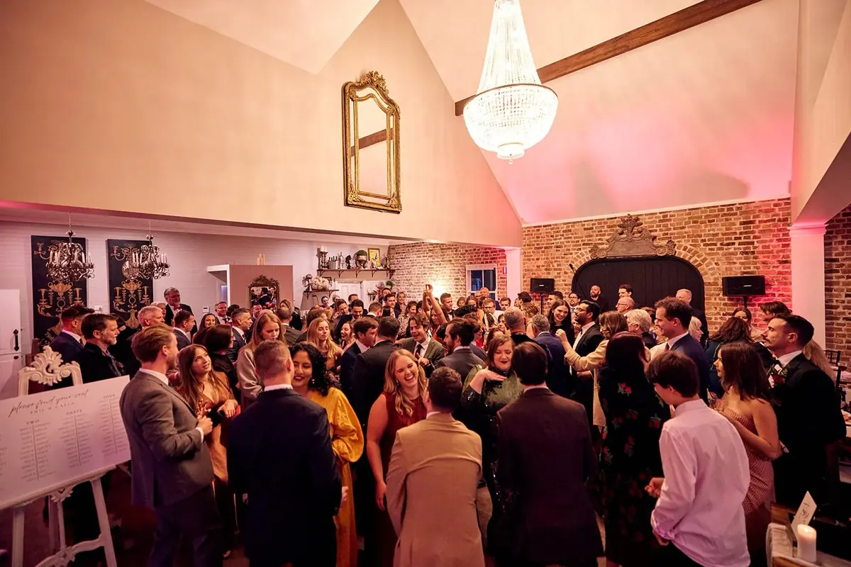 Wedding guests filling the dancefloor at a Montrose House reception in Sutton Forest