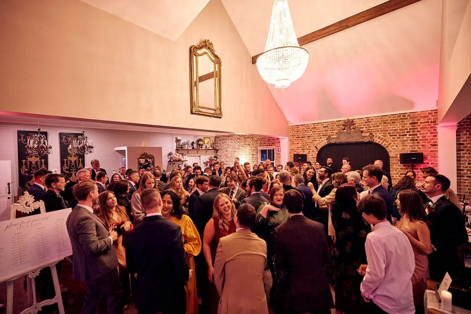 Wedding guests filling the dancefloor at Phil and Caela’s Montrose House reception